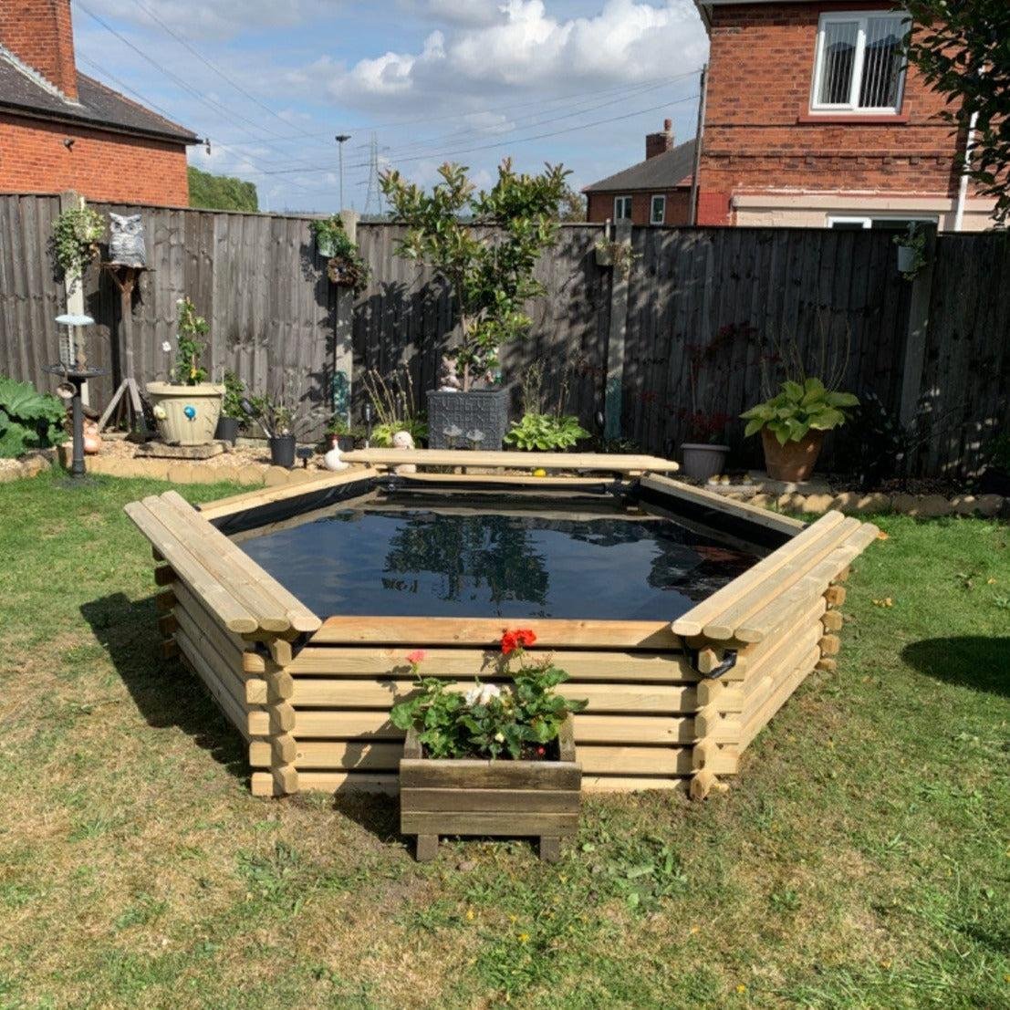 7_6ft-300-Gallon-Hexagonal-Wooden-Norlog-Pond-590mm-high_5d23b3a4-01db-44a9-bafb-bfaba0d9ff08